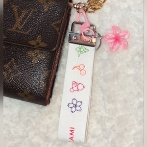 Louis Vuitton X Murakami White Strap with Red Logo and Pink Flower Charm